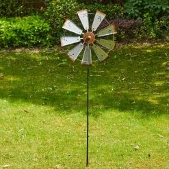 Glitzhome 69.4 in. H Farmhouse Metal Galvanized Wind Spinner Yard Stake or Wall Decor