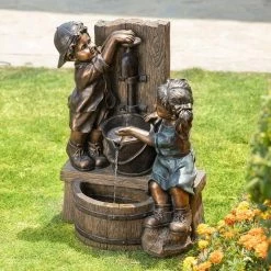 Glitzhome 25.5 in. H Polyresin Boy and Girl Sculptural Outdoor Fountain With Pump and LED Lights