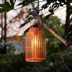 Glitzhome 9.75 in. H Metal Woven Orange Solar Powered Outdoor Hanging Lantern