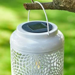 Glitzhome 8.75 in. H White Metal Cutout Solar Powered Outdoor Hanging Lantern -Design Toscano Sales Store whites glitzhome outdoor lanterns 2023300026 44 1000