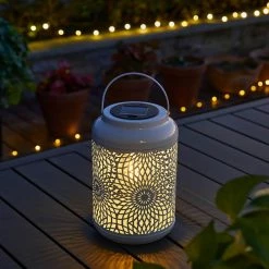 Glitzhome 8.75 in. H White Metal Cutout Solar Powered Outdoor Hanging Lantern